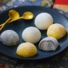 6 mochis glacés noix coco, sésame noir, mangue
