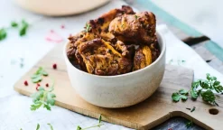 Bouchées de poulet tikka marinées, cuites