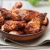 Manchons de poulet rôtis cuits