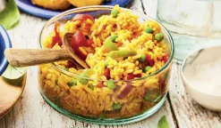 Riz cuisiné à l'espagnole (poivrons, petits pois)